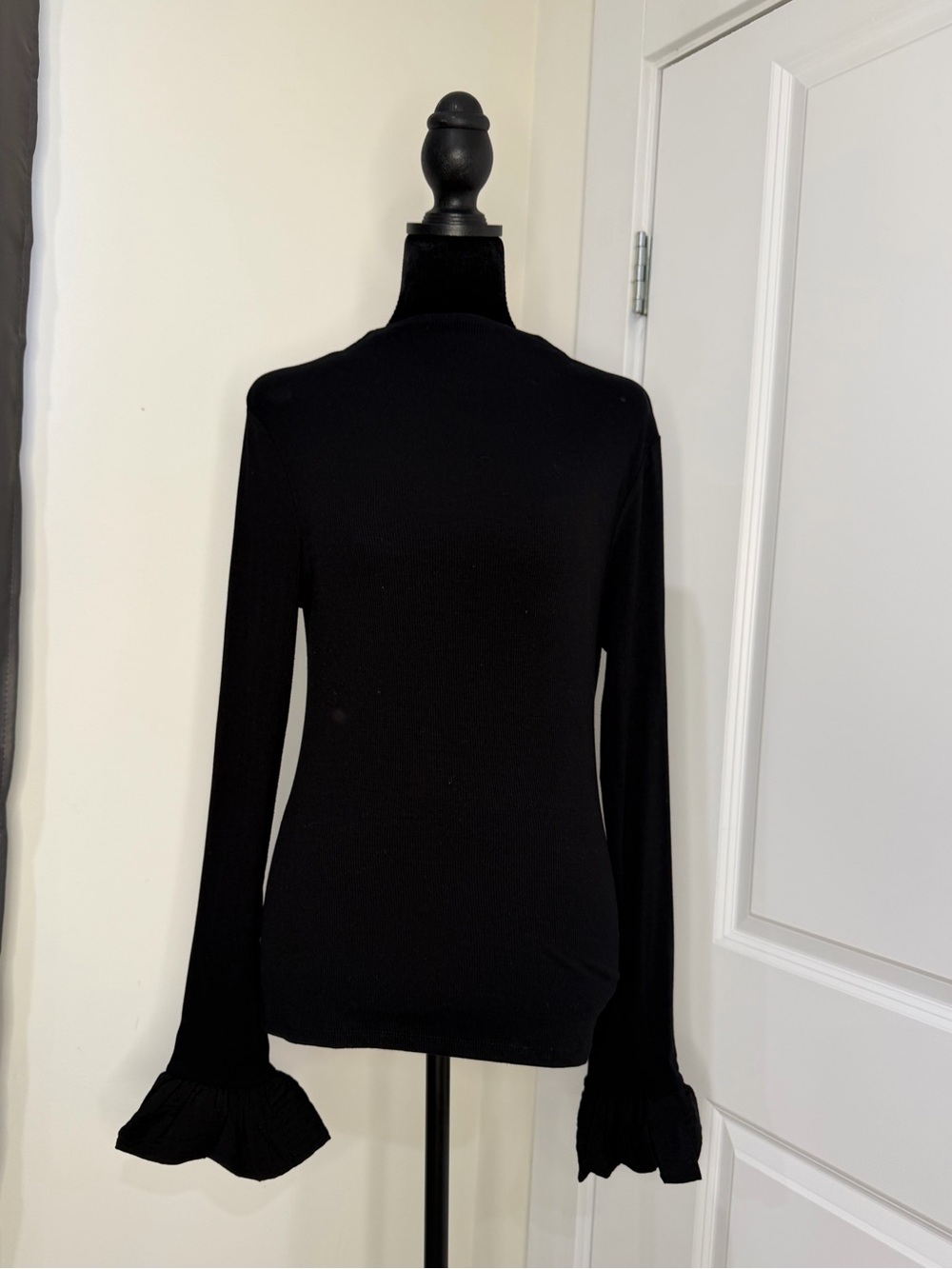 Black Long-Sleeve Ruffle Cuff Top - Women's